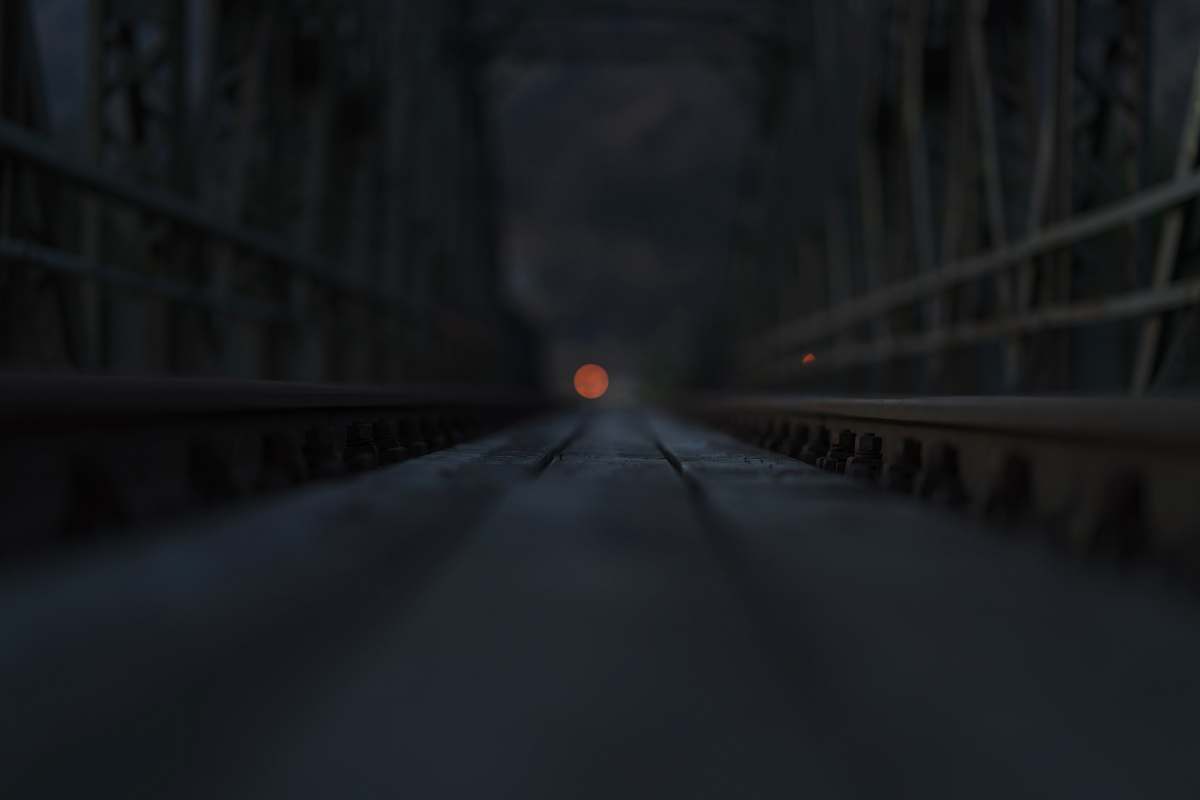 train track full moon at the end of hallway strau